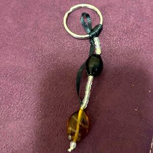 Handmade Beaded Keychain with Black and Amber Beads and black ribbon